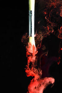 Close-up of fire against black background