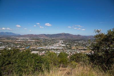 Aerial view of townscape against sky