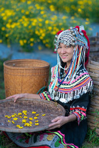 Woman sitting in basket