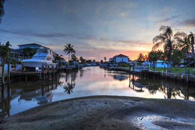 Waterway leading to the ocean near vanderbilt beach in naples, florida at sunset.