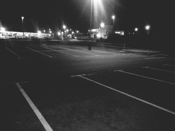 Illuminated street lights at night