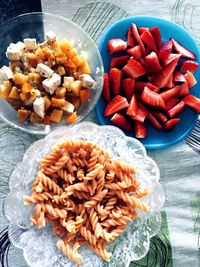 High angle view of chopped vegetables in bowl on table