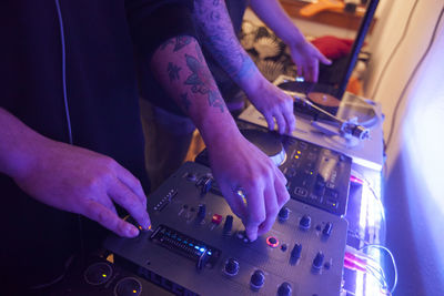 High angle view of men playing musician equipment