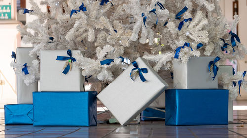 Row of christmas decorations on table