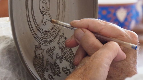 Close-up of human hand holding ring