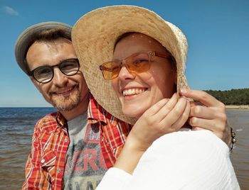 Portrait of smiling man wearing sunglasses