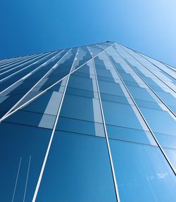 Low angle view of skyscraper against clear sky