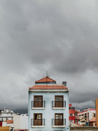 High section of building against sky