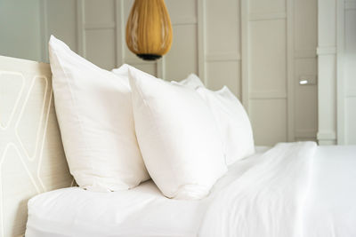 White relaxing on sofa at home