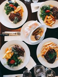 Directly above view of fresh meal served on table at restaurant