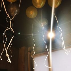 Close-up of balloons at night