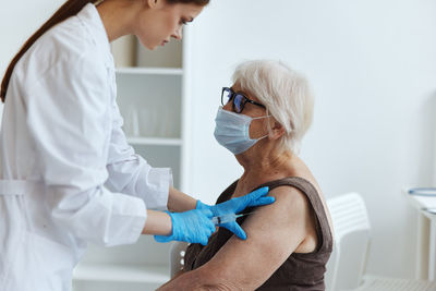 Midsection of woman holding hands