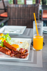 Close-up of breakfast served on table