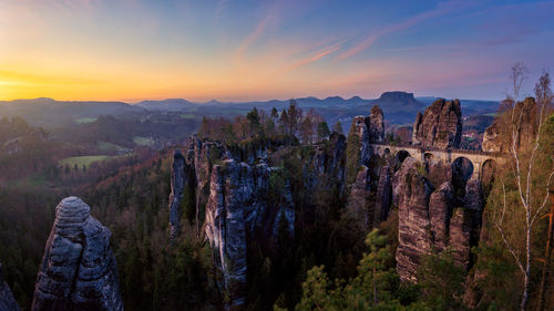 Panoramic view of bastei against sky during sunset