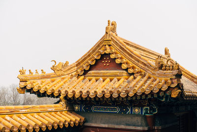 Low angle view of temple building against sky