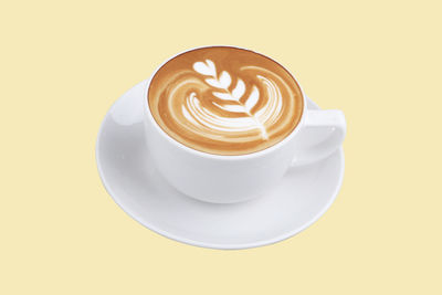 Coffee cup against white background