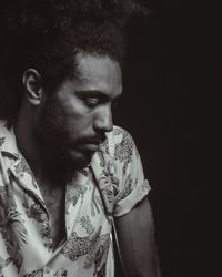 Portrait of young man looking away