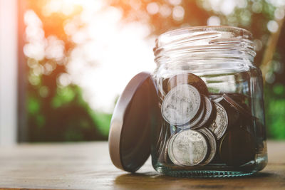 Close-up of coins on table