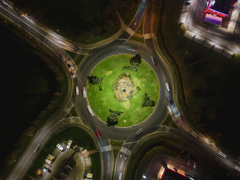 High angle view of light trails on road at night