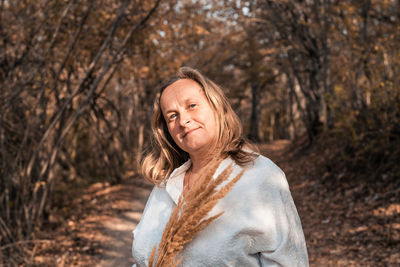 Portrait of a woman in a forest