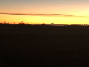 Scenic view of silhouette landscape against sky during sunset