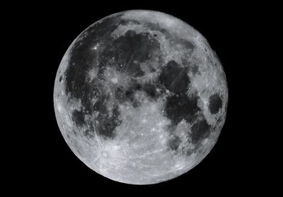 Scenic view of moon against sky at night