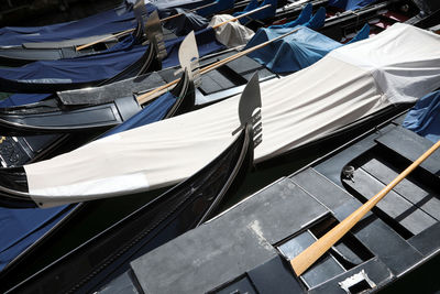 High angle view of sailboats moored in water