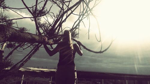 Close-up of woman against sky