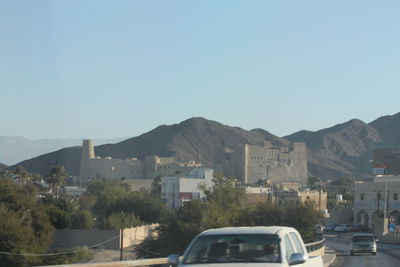 View of mountains against clear blue sky