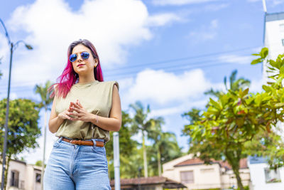 Young woman standing outdoors