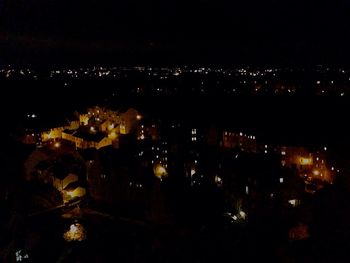 Illuminated cityscape at night