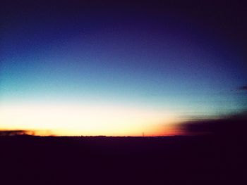 Scenic view of landscape at sunset