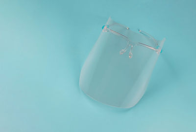 High angle view of blue candle on table