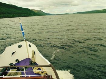 Boat in sea against sky