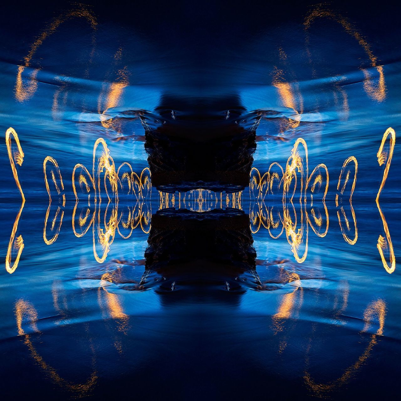 reflection, water, blue, symmetry, no people, nature, digital composite, illuminated, pattern, motion, rippled, studio shot, text, communication, waterfront, abstract, outdoors, swimming, blue background