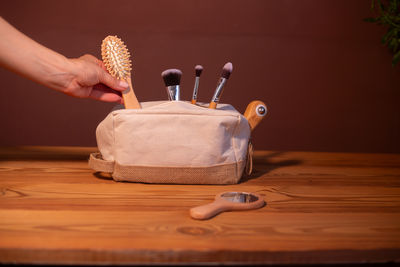 High angle view of hand on table