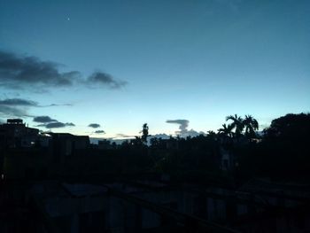 High angle view of buildings against sky at sunset