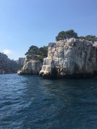 Scenic view of sea against clear blue sky