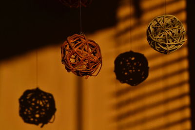 Close-up of christmas decoration hanging on ceiling