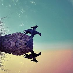 Low angle view of jumping jumping against sky