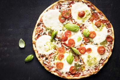 High angle view of pizza on table