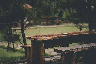 Empty bench on table in park
