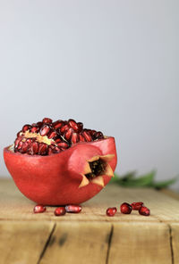 Close-up of chopped fruit on table against white background