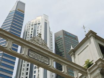 Low angle view of skyscrapers against sky