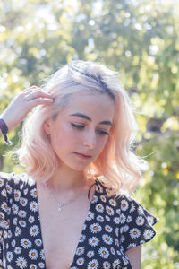Portrait of young woman outdoors