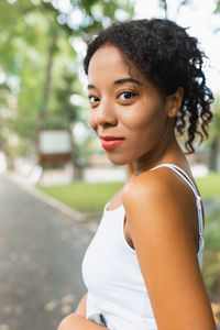 Portrait of young woman looking away