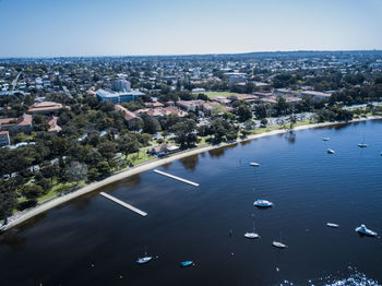 High angle view of river amidst buildings in city
