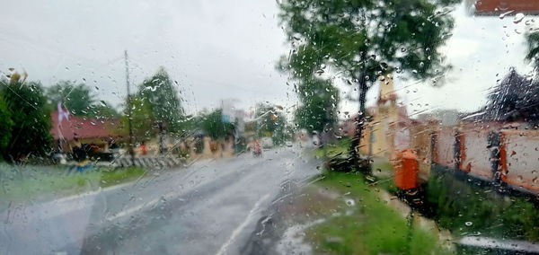 Wet glass window in rainy season