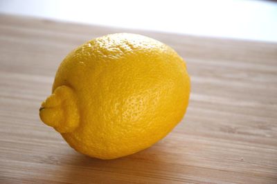 Close-up of lemon on table