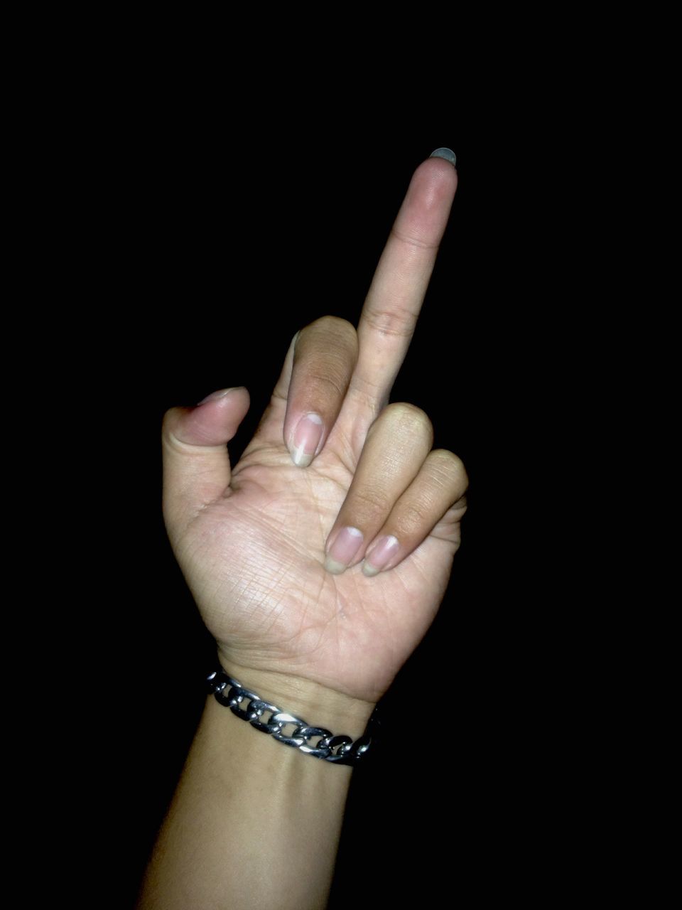 person, part of, human finger, studio shot, holding, cropped, close-up, black background, indoors, lifestyles, copy space, personal perspective, showing, unrecognizable person, ring, leisure activity